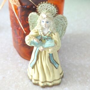 Vintage November birthday angel figurine